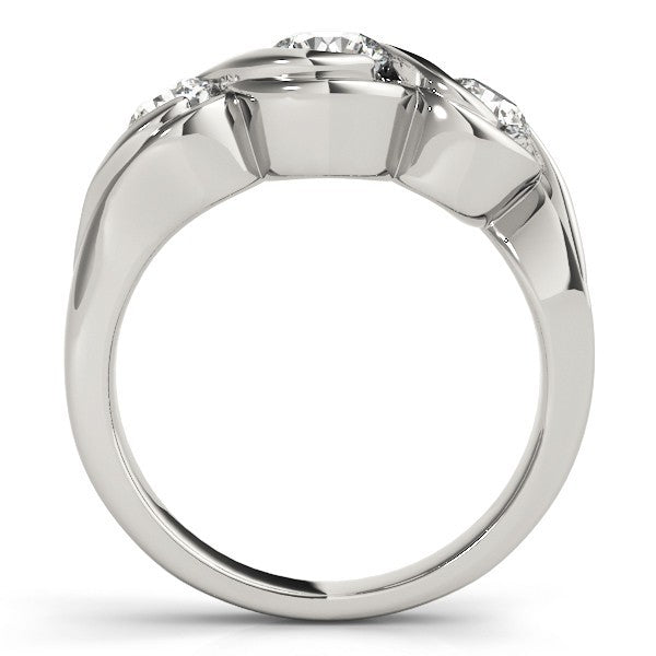 Silver ring with diamond accents on a white background