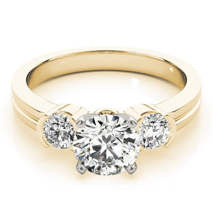 Gold ring with a central diamond flanked by two smaller diamonds on a white background