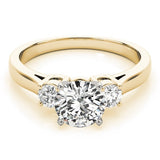 Gold ring with a diamond on a white background