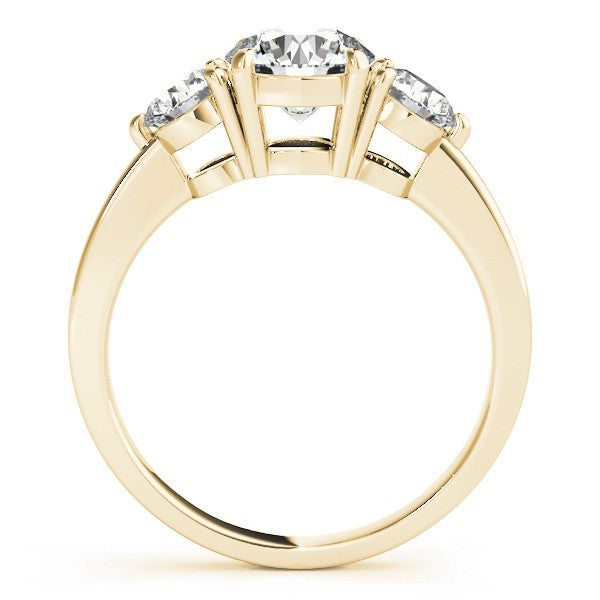 Gold ring with three diamonds on a white background
