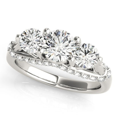 Diamond ring with three circular diamonds on a white background