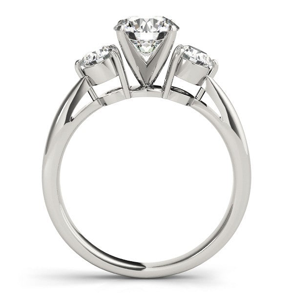 Diamond ring with three stones on a white background