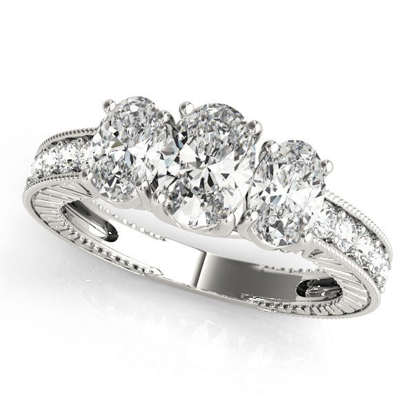 Diamond ring with multiple stones on a white background