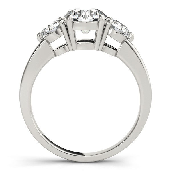 Diamond ring with three stones on a white background