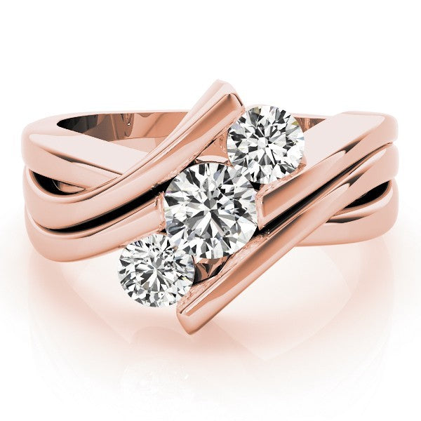 Rose gold ring with three diamonds on a white background