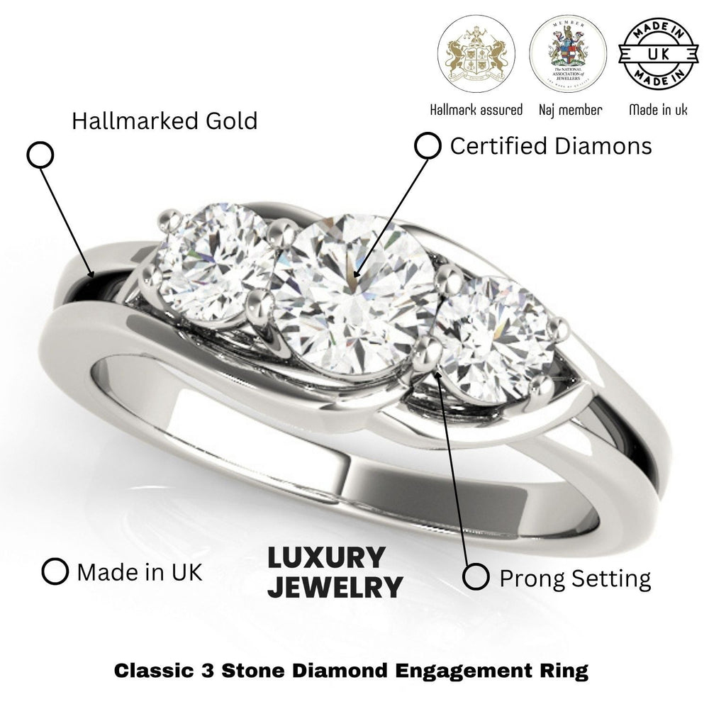 Classic 3-stone diamond engagement ring with hallmarking details on a white background
