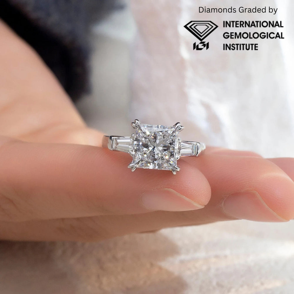 Diamond ring on a finger with International Gemological Institute logo