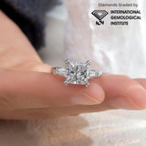 Diamond ring on a finger with International Gemological Institute logo
