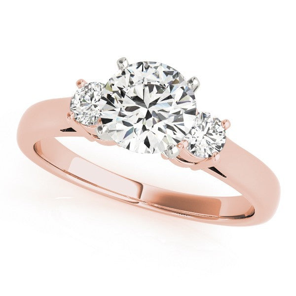 Rose gold ring with three diamonds on a white background
