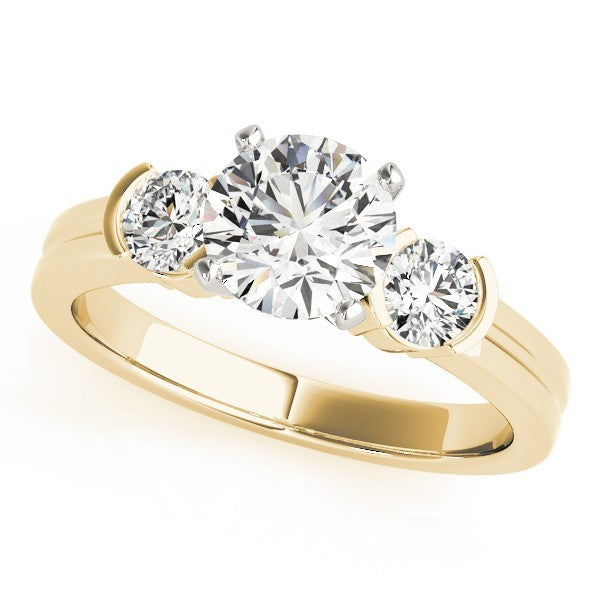 Gold ring with three diamonds on a white background