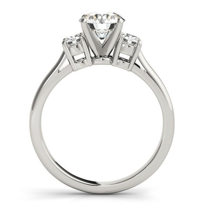 Diamond ring with three gemstones on a white background