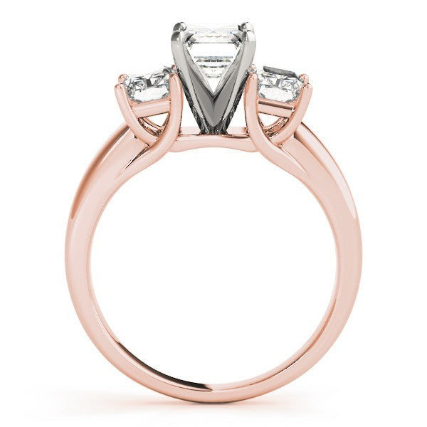 Rose gold ring with a central diamond and smaller diamonds on a white background
