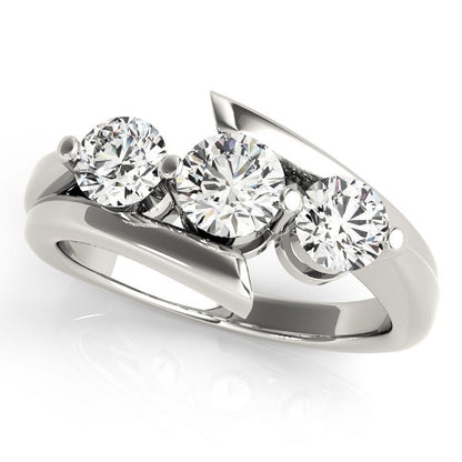 Silver ring with three diamonds on a white background