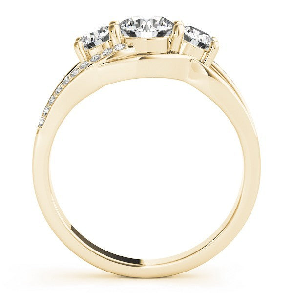 Gold ring with three diamonds on a white background