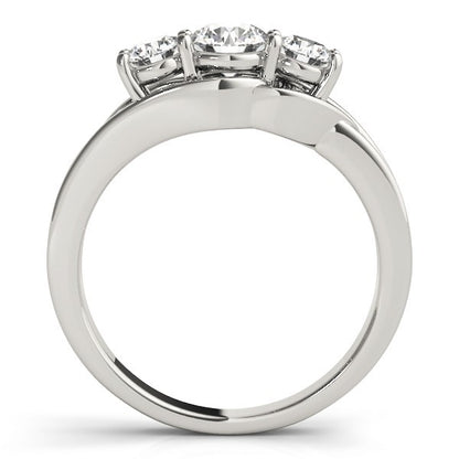 Diamond ring with three stones on a white background