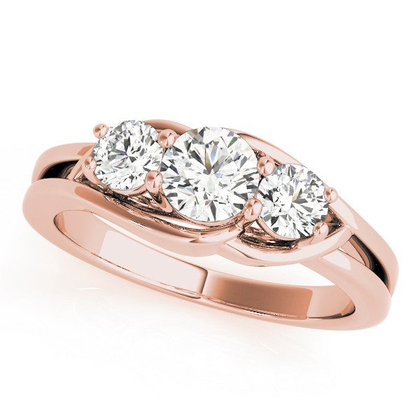 Rose gold ring with three diamonds on a white background