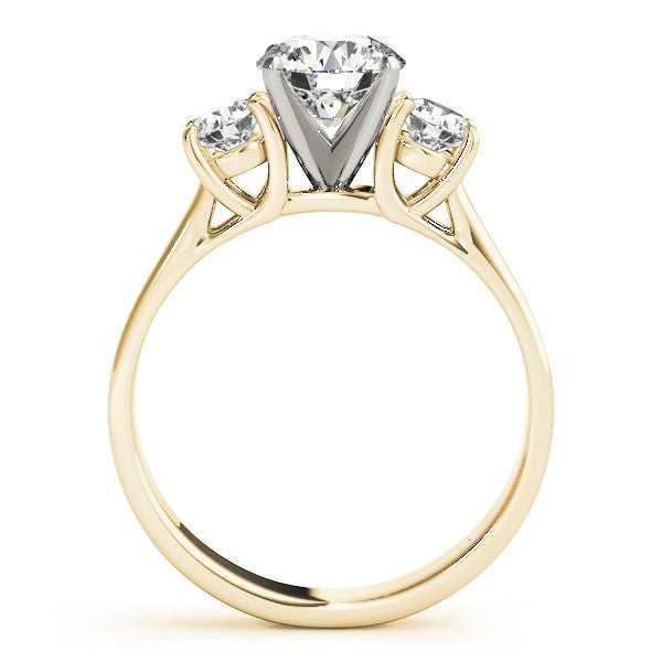 Gold ring with a central diamond and two smaller diamonds on a white background