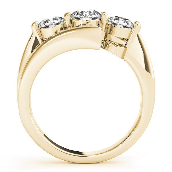 Gold ring with three diamonds on a white background