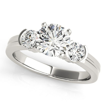 Three-stone diamond ring on a white background