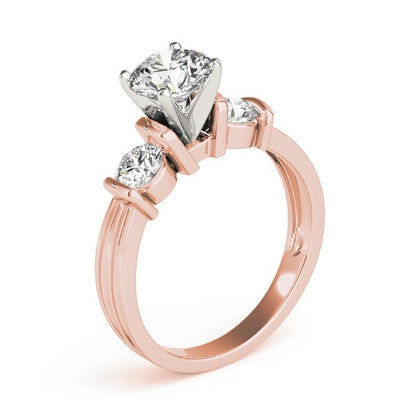 Rose gold ring with three diamonds on a white background