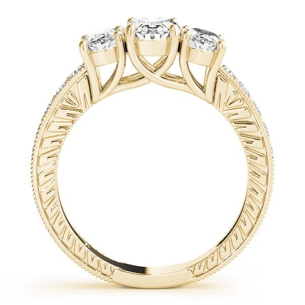 Gold ring with three diamonds on a white background