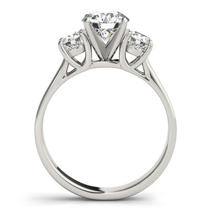 Diamond ring with three clear gemstones on a white background
