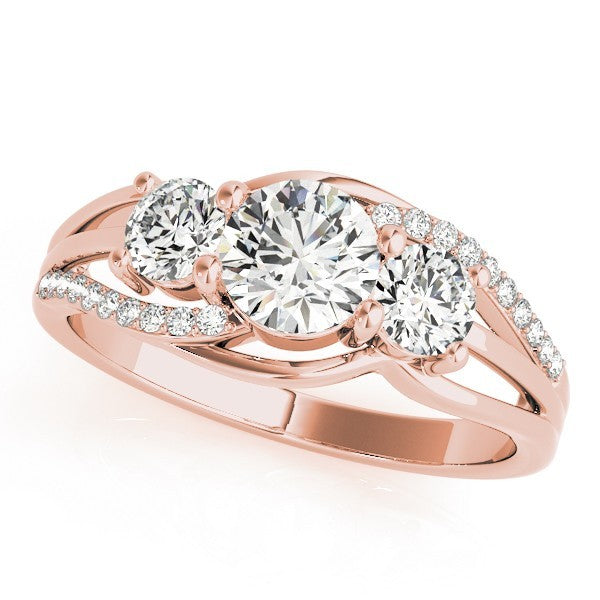 Rose gold ring with three diamonds on a white background