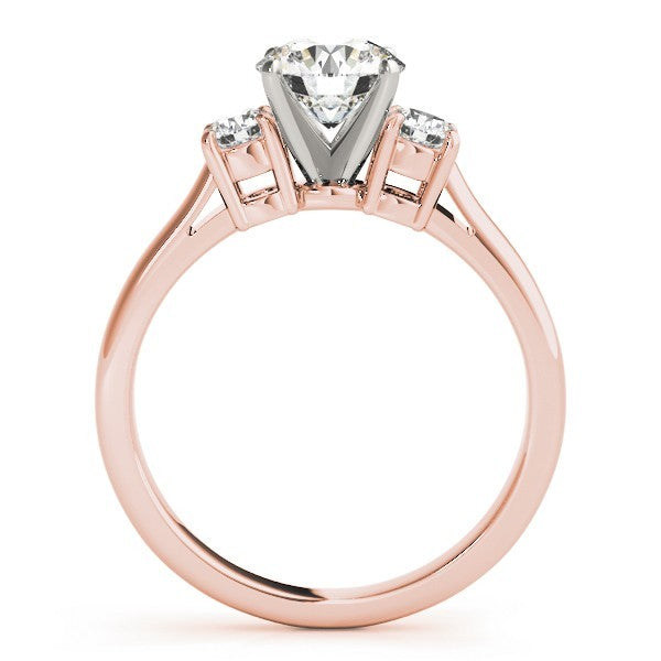 Rose gold ring with a diamond on a white background