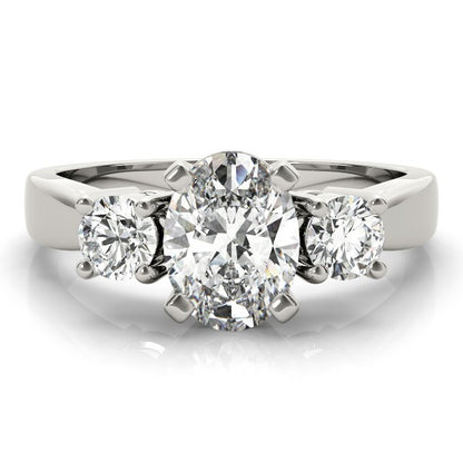 Diamond ring with three round diamonds on a white background