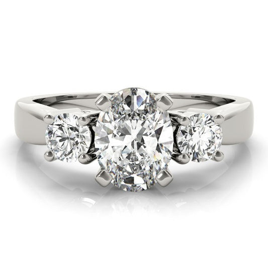 Diamond ring with three round diamonds on a white background