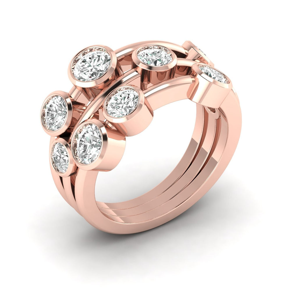 Rose gold ring with diamonds on a white background