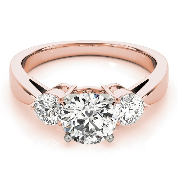 Rose gold ring with three diamonds on a white background