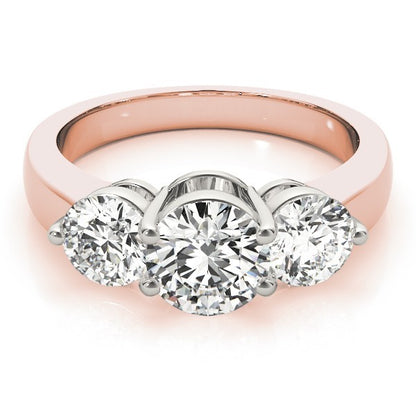 Rose gold ring with three diamond stones on a white background