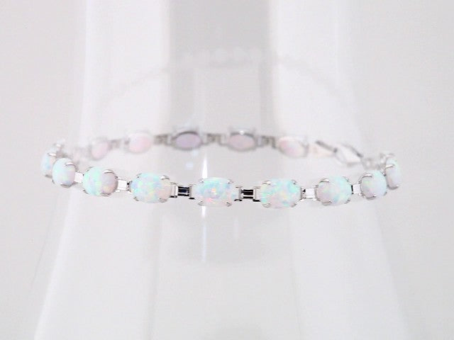 Oval Lab-Grown White Opal Line Bracelet In Gold & Platinum