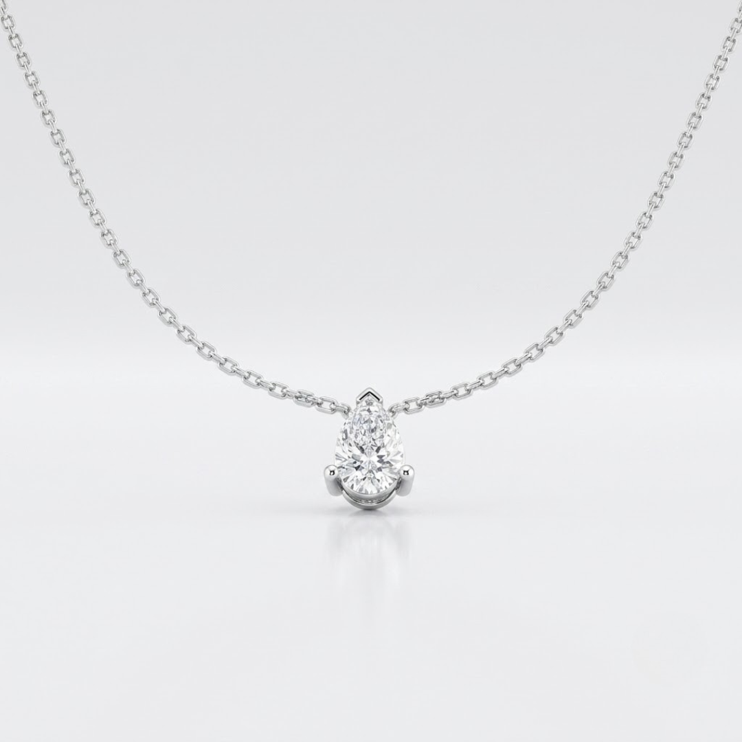 Stunning white gold pear diamond solitaire pendant for her.